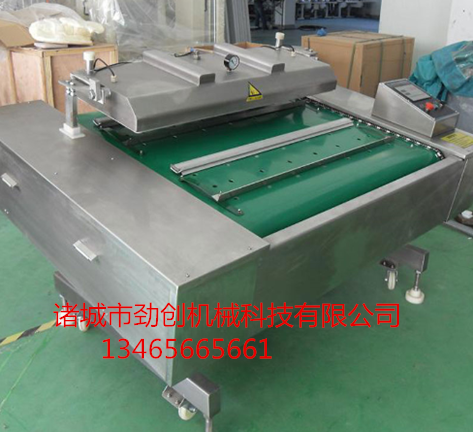 1000型滚动式真空包装机